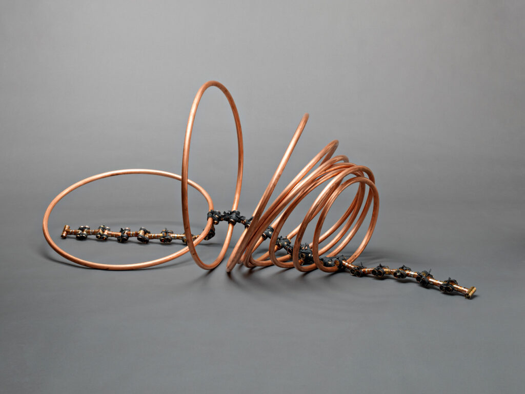 A copper sculpture by eDuard Helmbold inspired by the Afrikaans poem Raka.